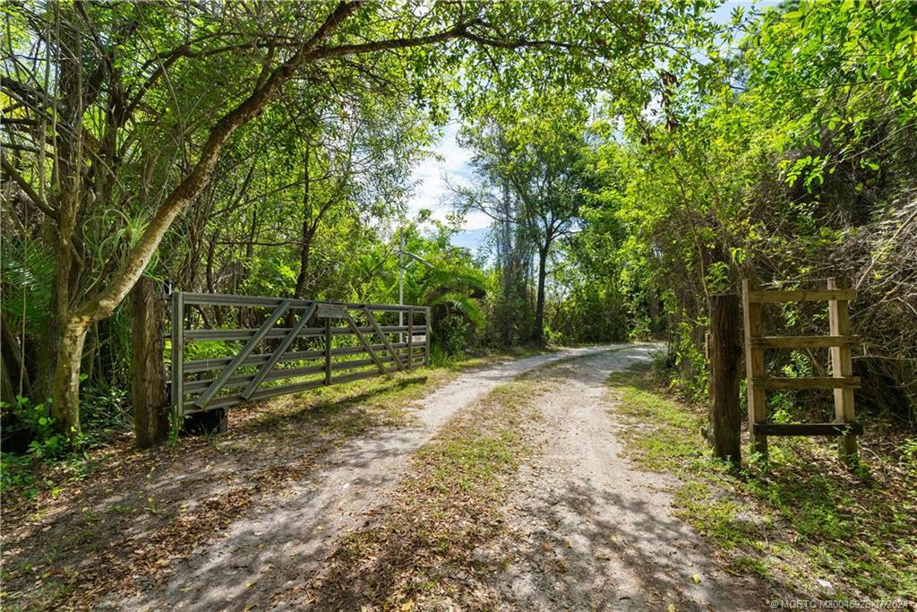 7100 SE 138TH ST, HOBE SOUND, FL 33455, photo 1 of 21